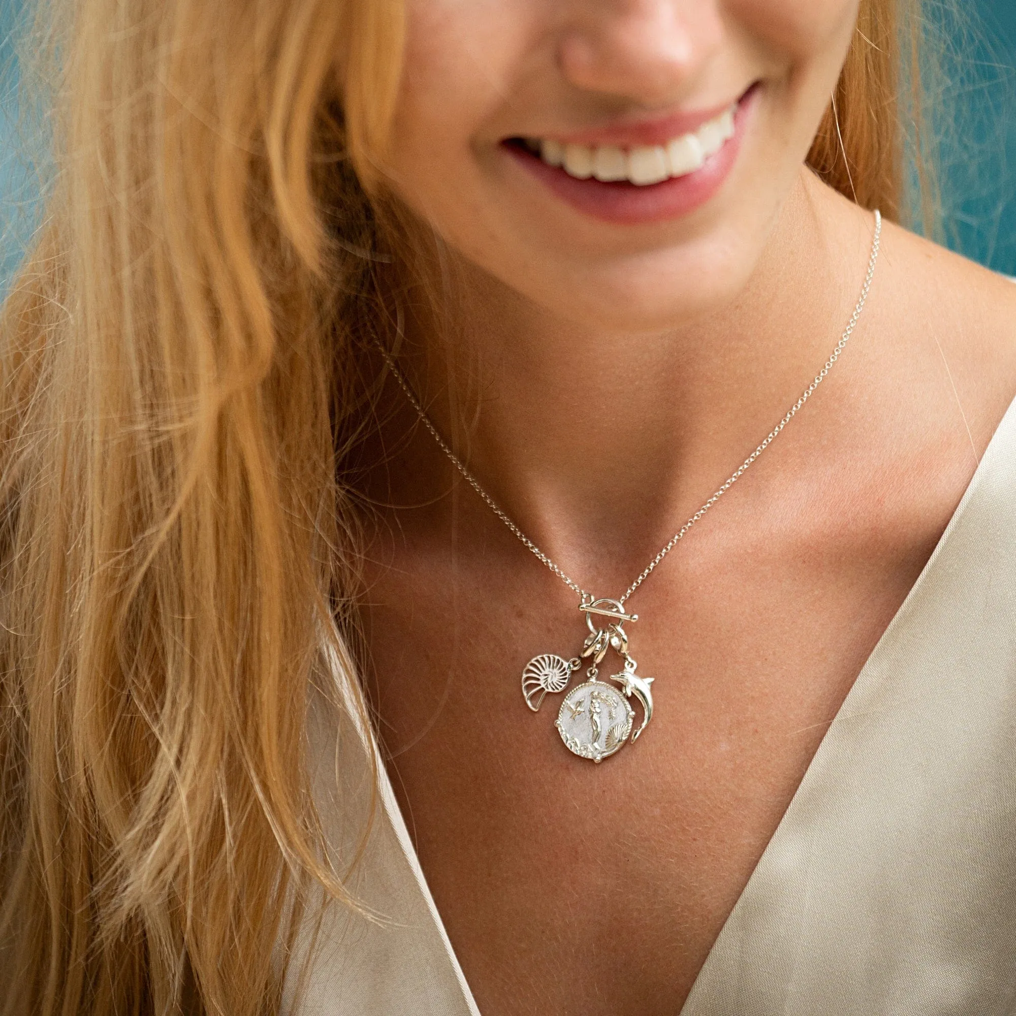 Silver Shell Slice Charm